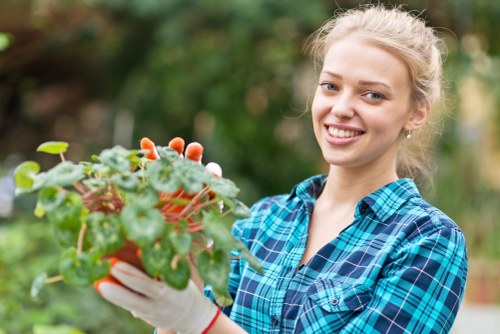 Team member preparing tools before starting garden maintenance